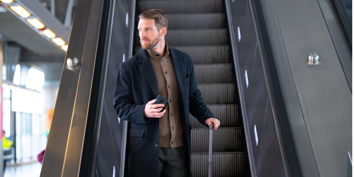 a man on an escalator