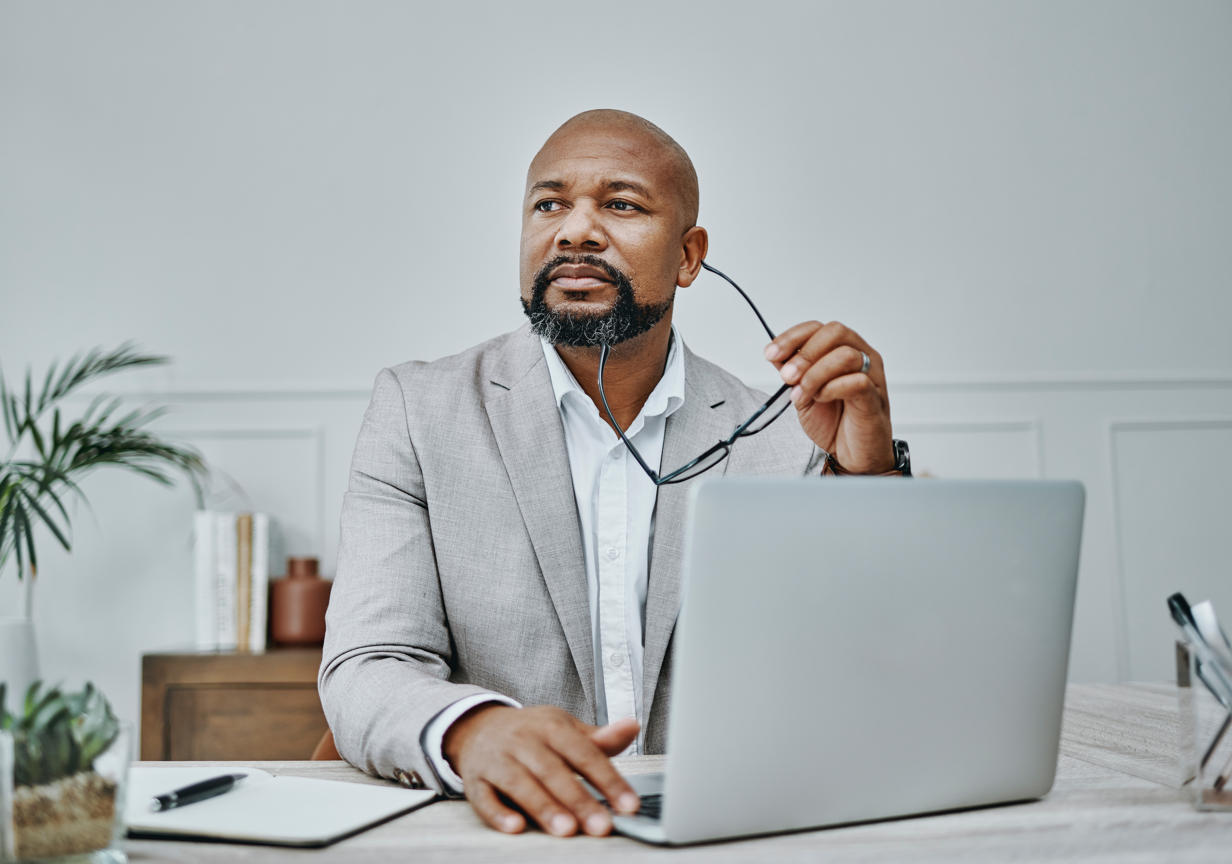 A CFO sitting by the desk 