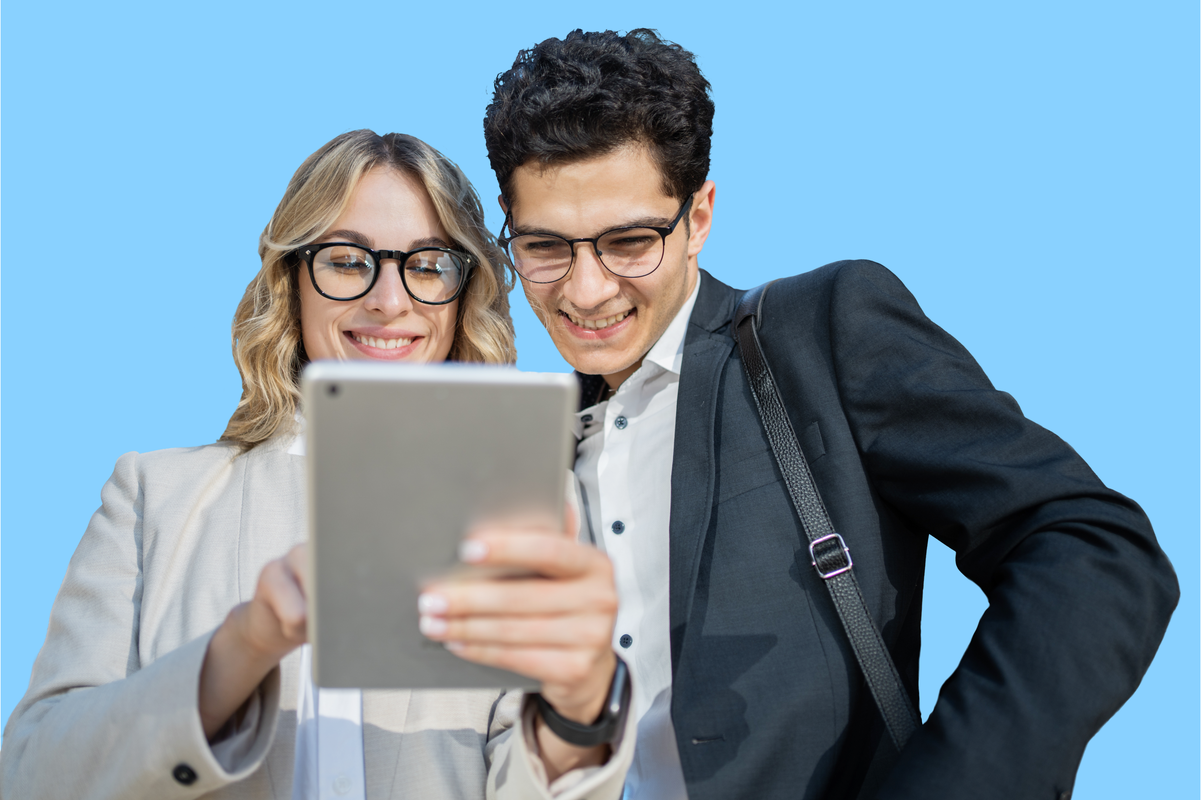 Woman and man looking at the cost of employee spending on an ipad